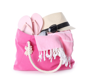 Photo of Bag with beach accessories on white background