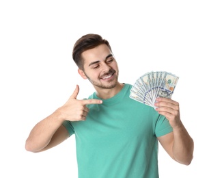 Portrait of happy young man with money on white background