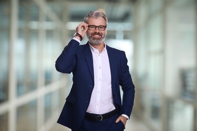 Image of Successful lawyer in glasses on blurred background