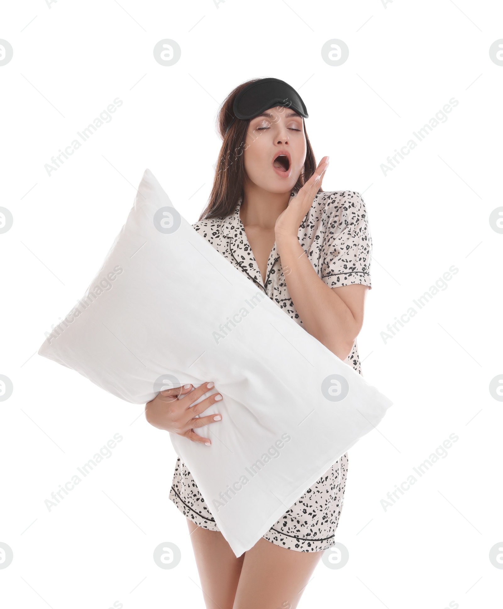 Photo of Beautiful woman with pillow on white background. Bedtime