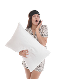 Photo of Beautiful woman with pillow on white background. Bedtime