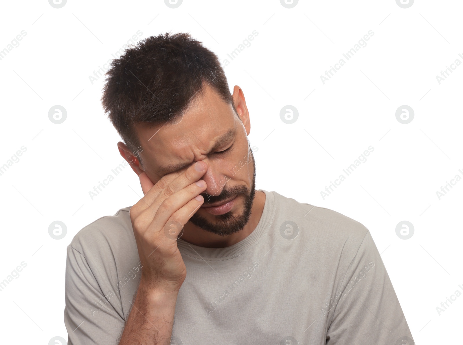 Photo of Man suffering from eyestrain on white background