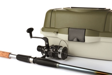 Photo of Box for tackle and fishing rod on white background