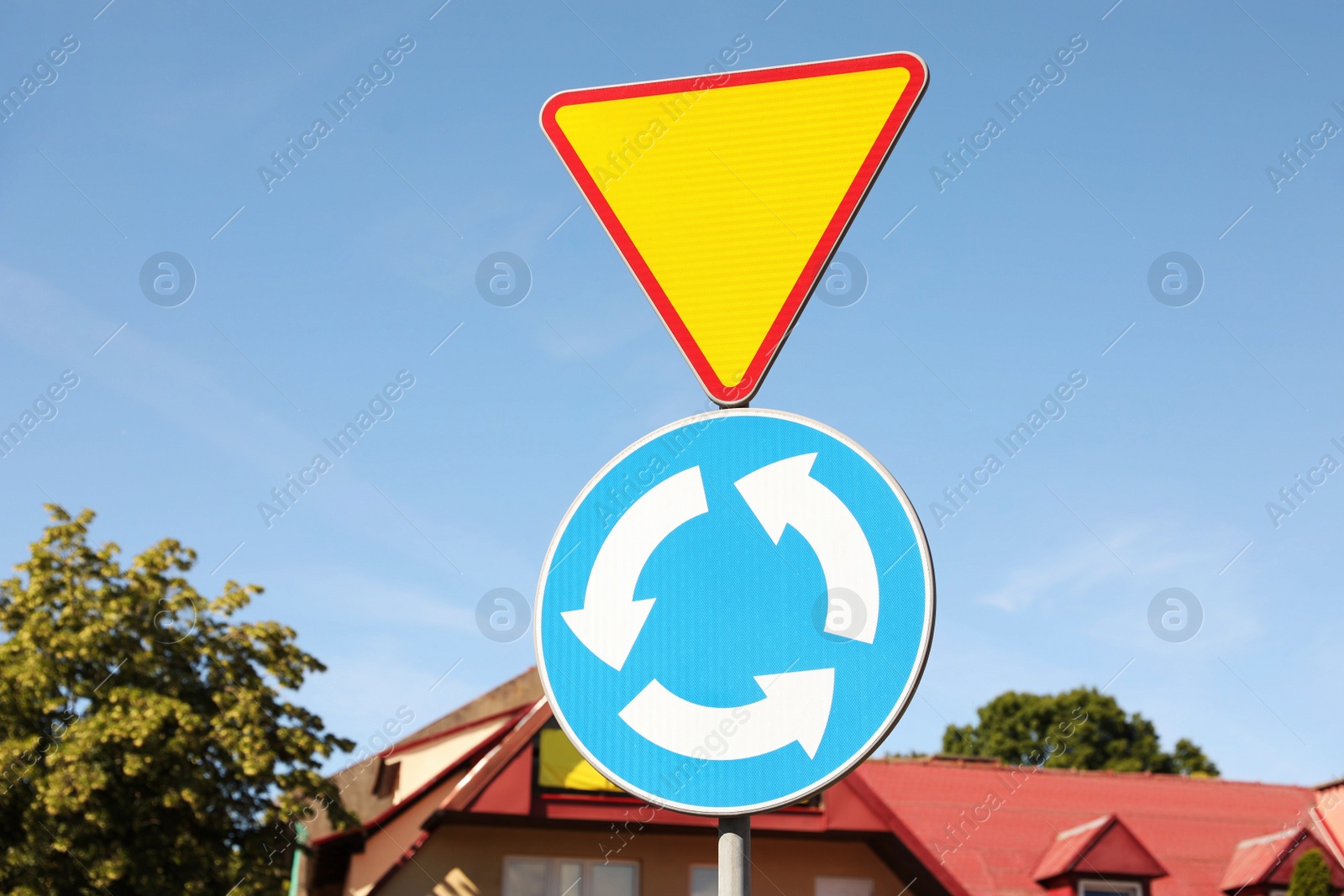 Photo of Different road signs on city street. Traffic rules