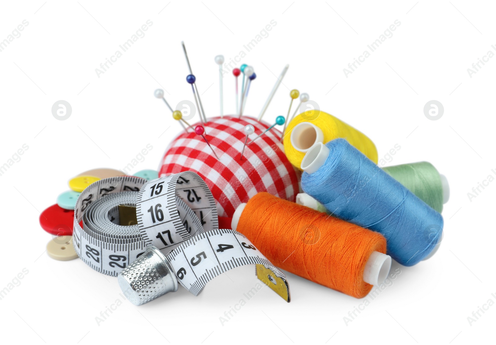 Photo of Set of different sewing accessories on white background