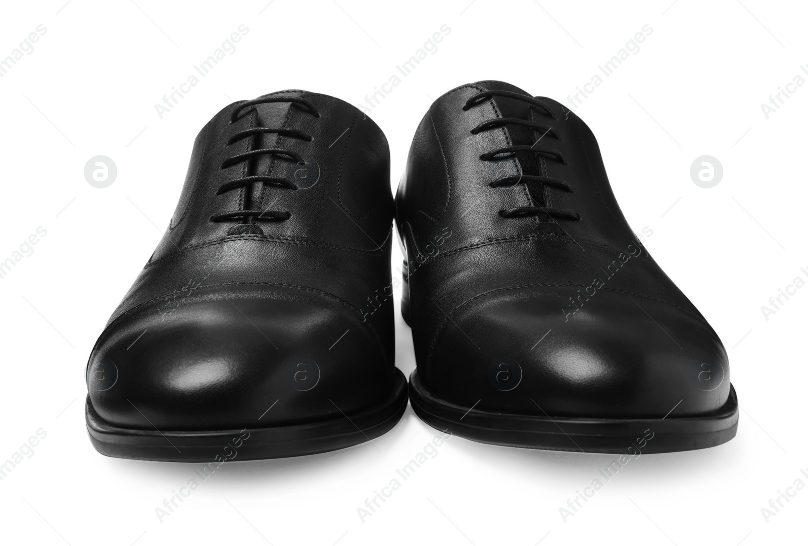 Photo of Pair of black leather men shoes isolated on white