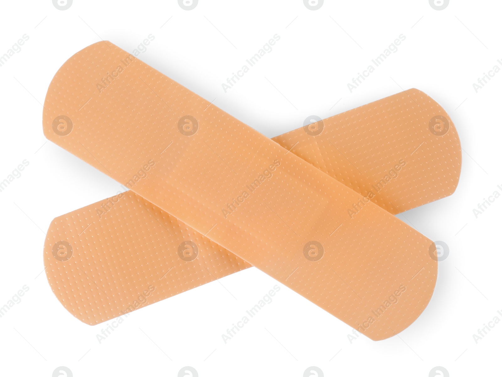 Photo of Medical adhesive bandages isolated on white, top view