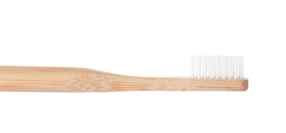 Bamboo toothbrush on white background. Dental care