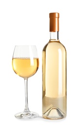 Glass and bottle of delicious wine on white background