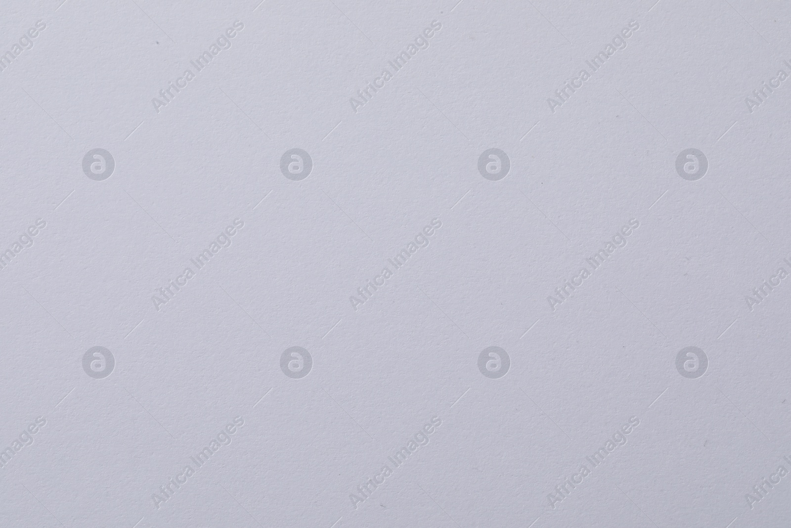 Photo of Texture of white paper sheet as background, closeup