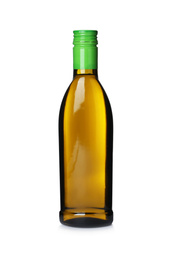 Photo of Cooking oil in glass bottle isolated on white