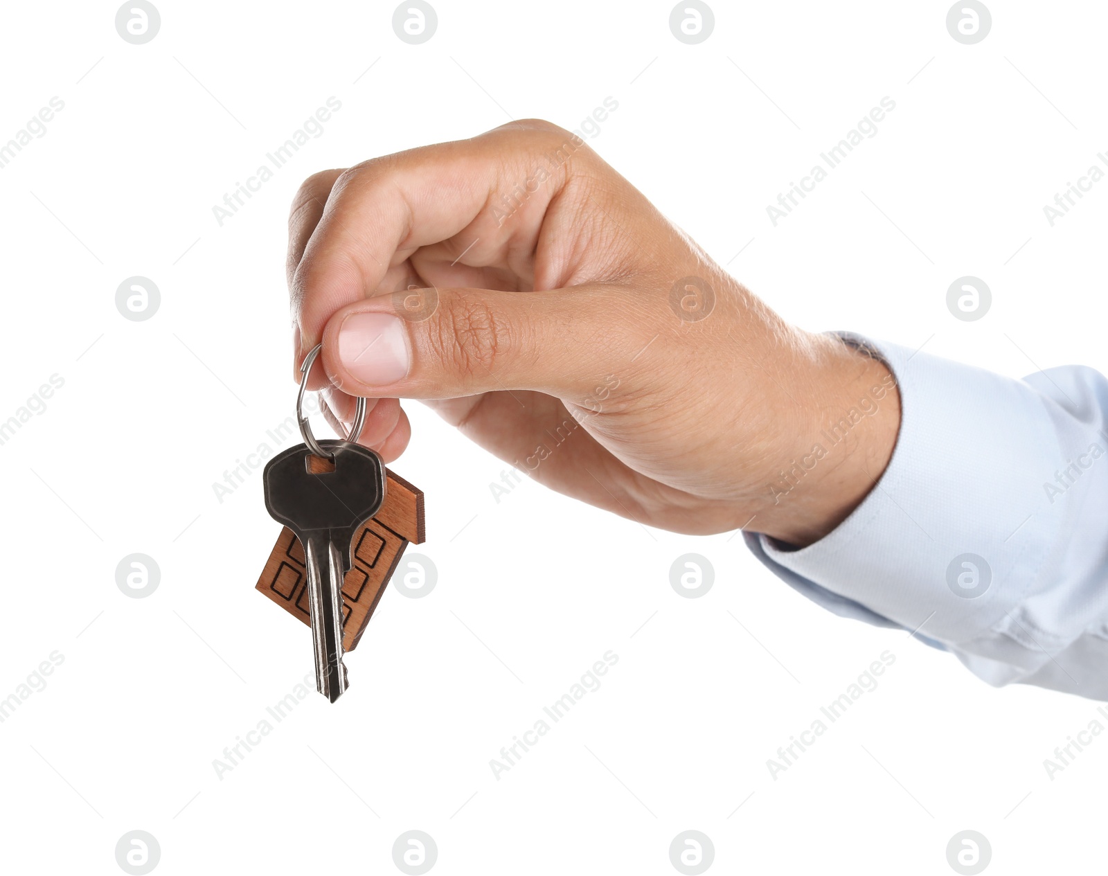 Photo of Real estate agent with key on white background