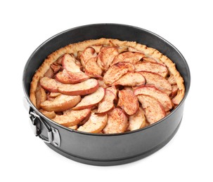 Delicious apple pie in baking dish isolated on white