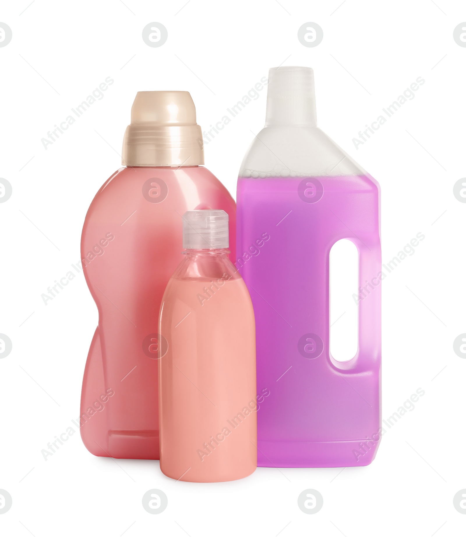 Photo of Different bottles with detergents on white background