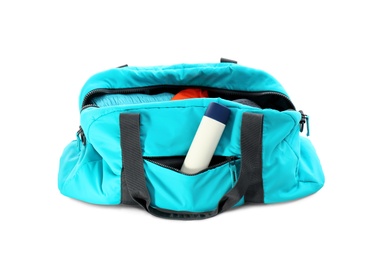 Photo of Sport bag with deodorant on white background