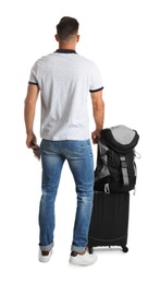 Photo of Man with suitcase and backpack for vacation trip on white background, back view. Summer travelling