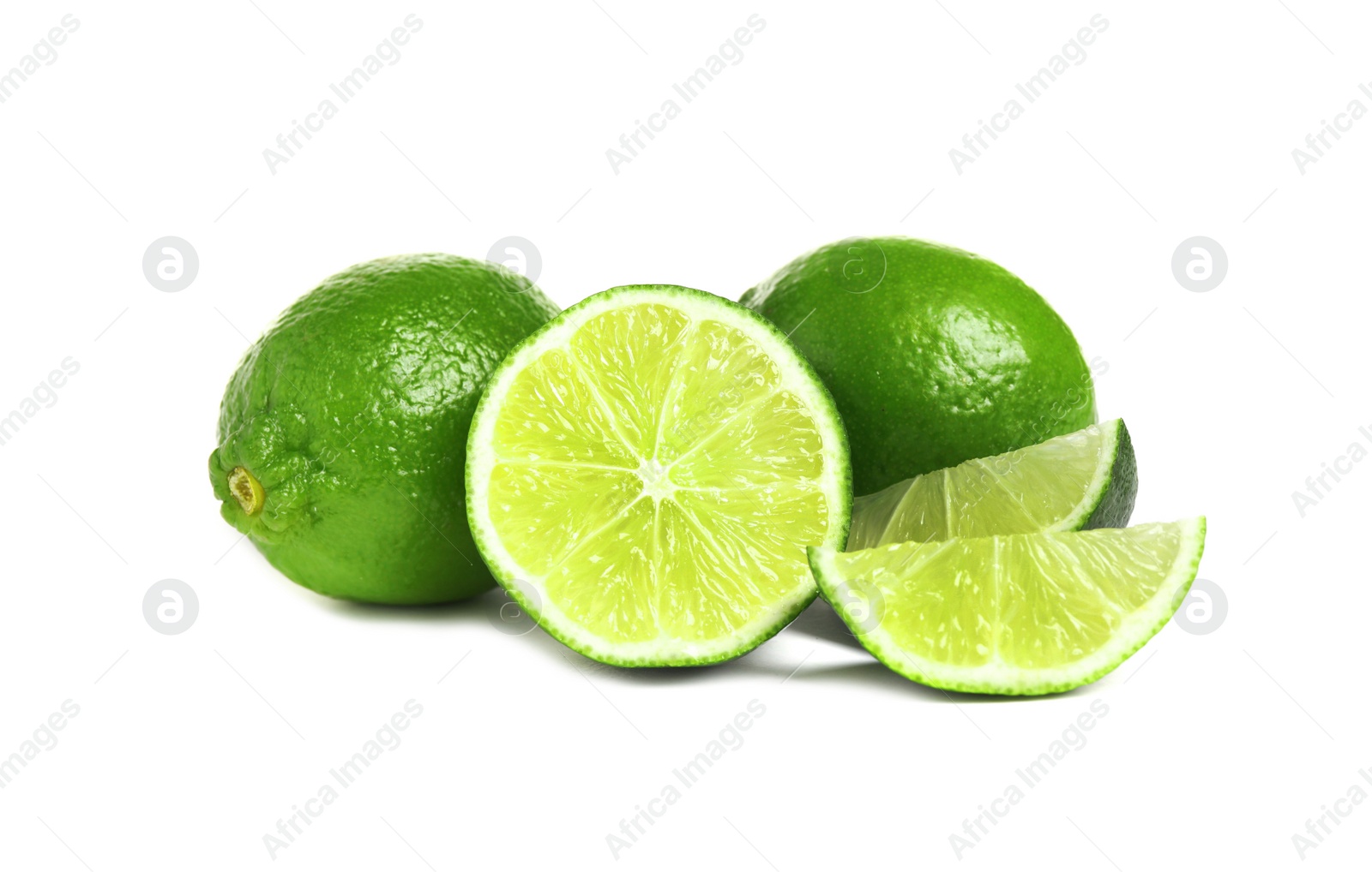 Photo of Fresh ripe green limes isolated on white