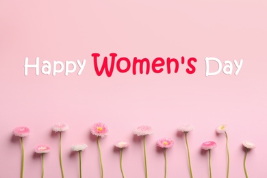 Image of Spring flowers on pink background, flat lay. Happy Women's Day