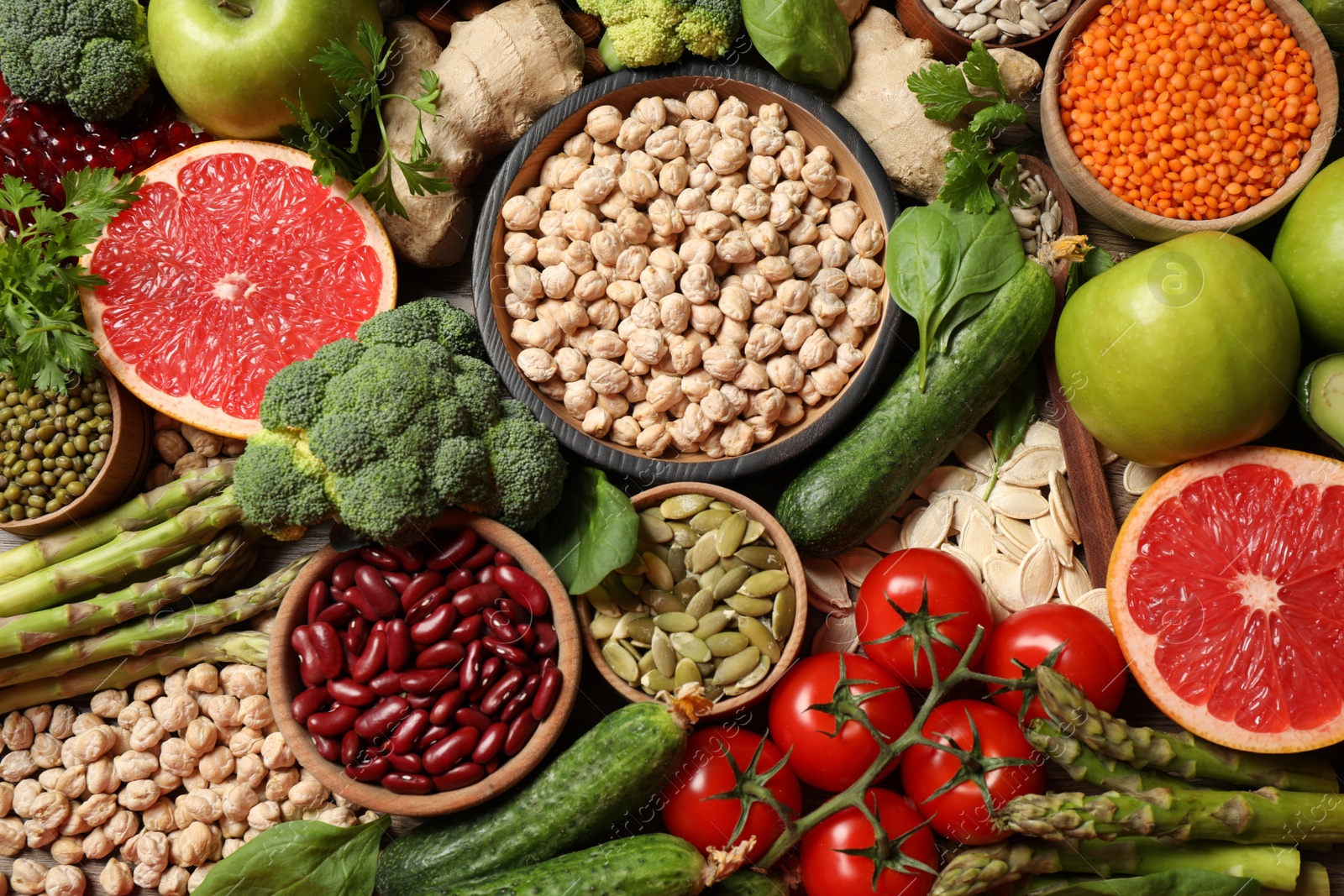 Photo of Fresh vegetables, fruits and seeds on table, flat lay