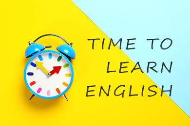 Image of Alarm clock and text Time To Learn English on color background