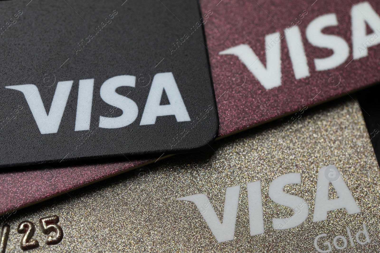 Photo of MYKOLAIV, UKRAINE - FEBRUARY 22, 2022: Visa credit cards as background, closeup