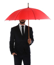 Photo of Businessman with red umbrella on white background