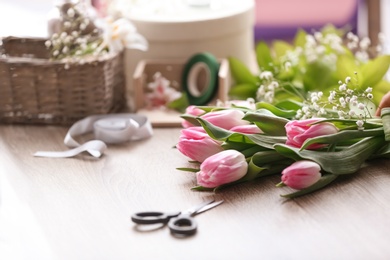 Photo of Decorator's workplace with beautiful flowers