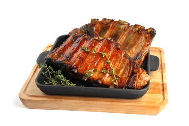 Tasty grilled ribs with thyme isolated on white