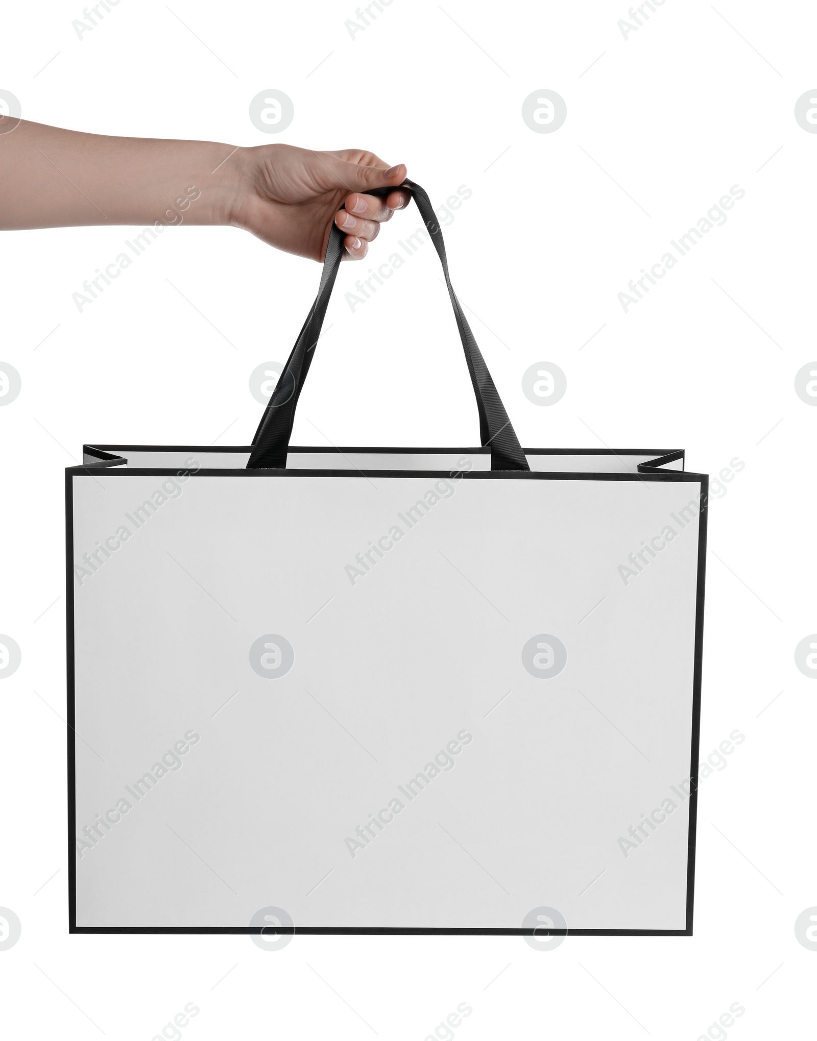 Photo of Woman holding paper bag on white background, closeup. Mockup for design