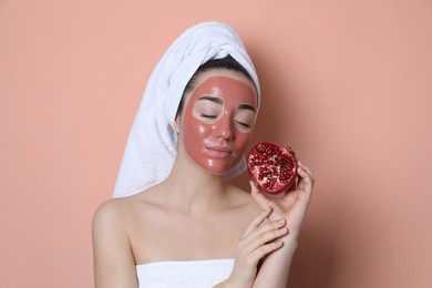 Photo of Woman with pomegranate face mask and fresh fruit on  pale coral background