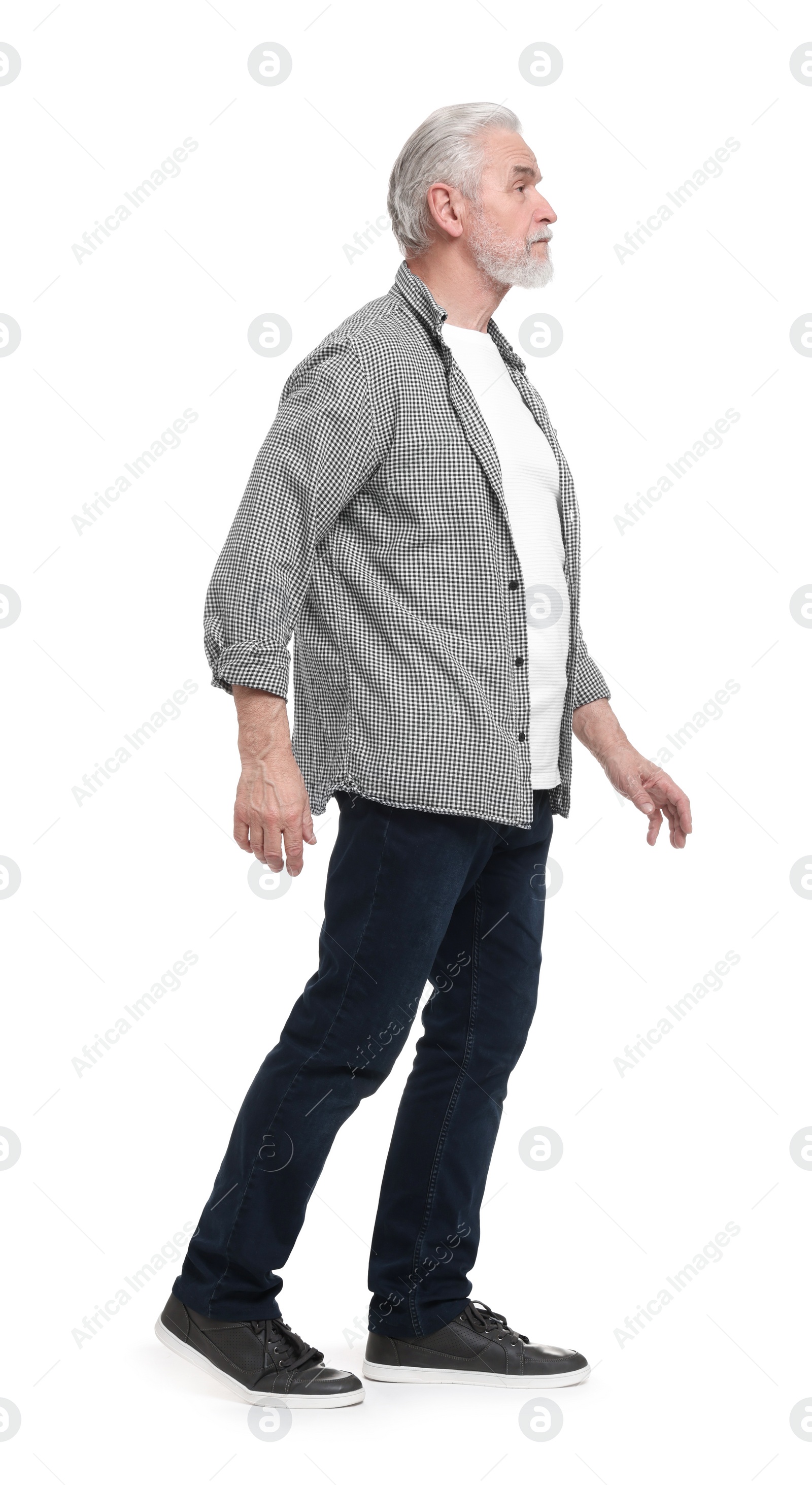 Photo of Full length portrait of senior man on white background