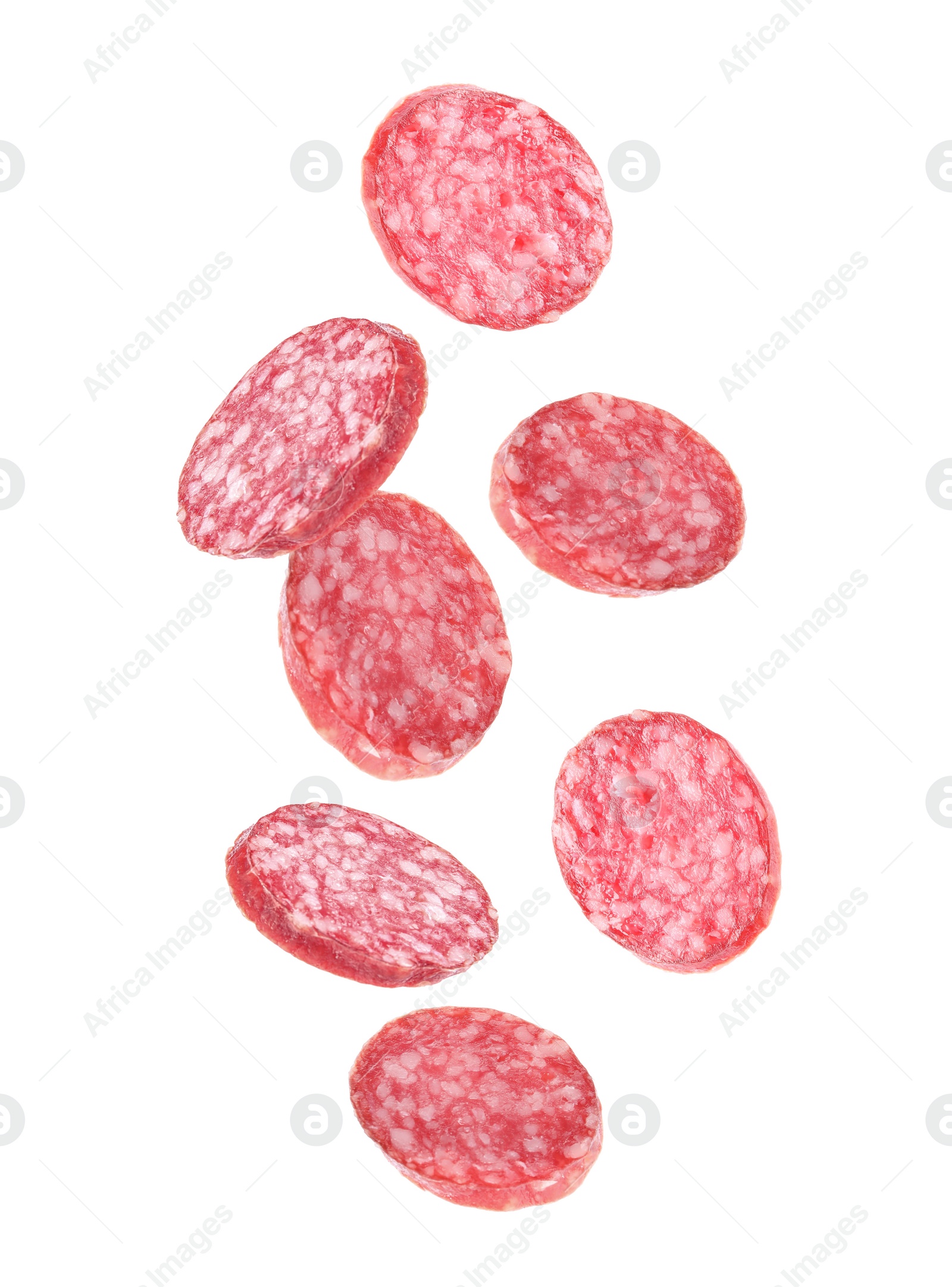 Image of Set of flying cut fresh sausage on white background