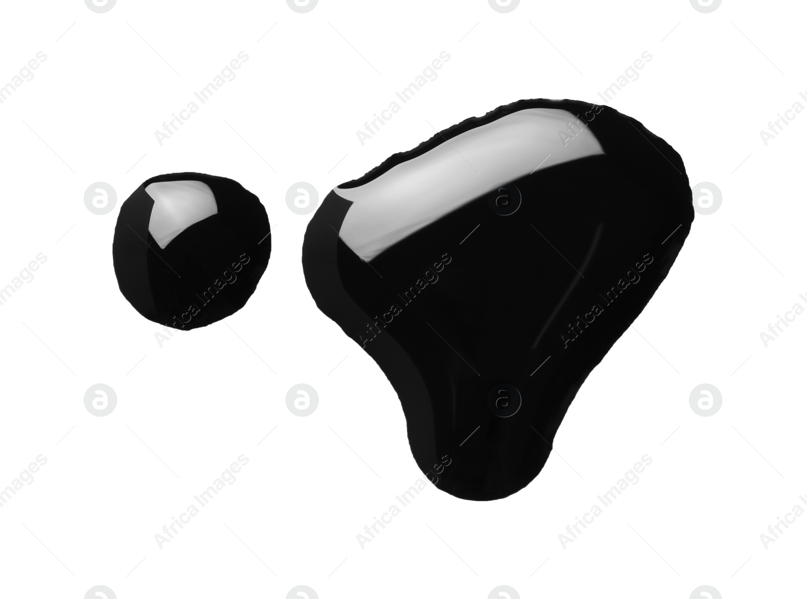 Photo of Blobs of black oil isolated on white, top view