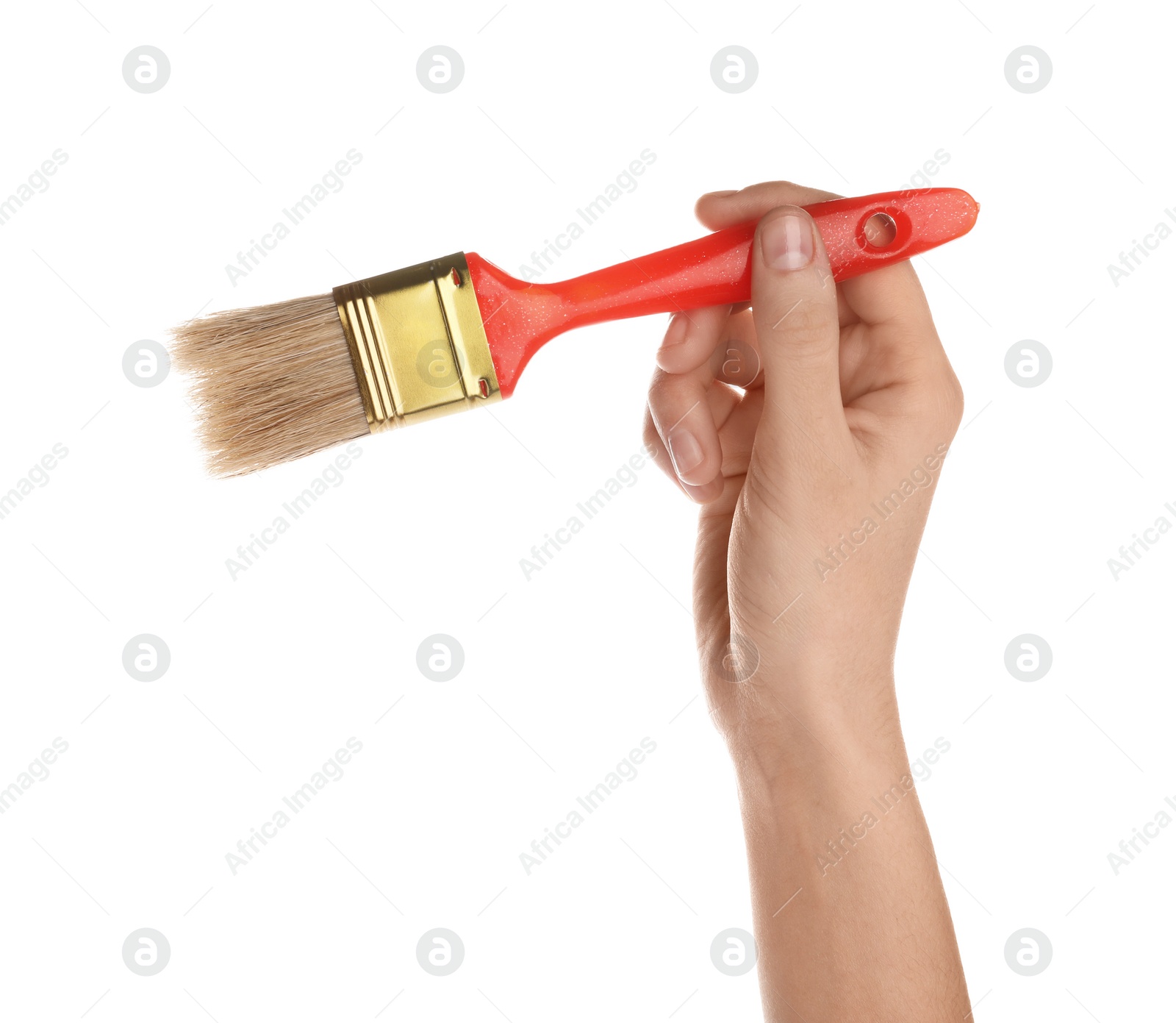 Photo of Woman holding paint brush on white background, closeup