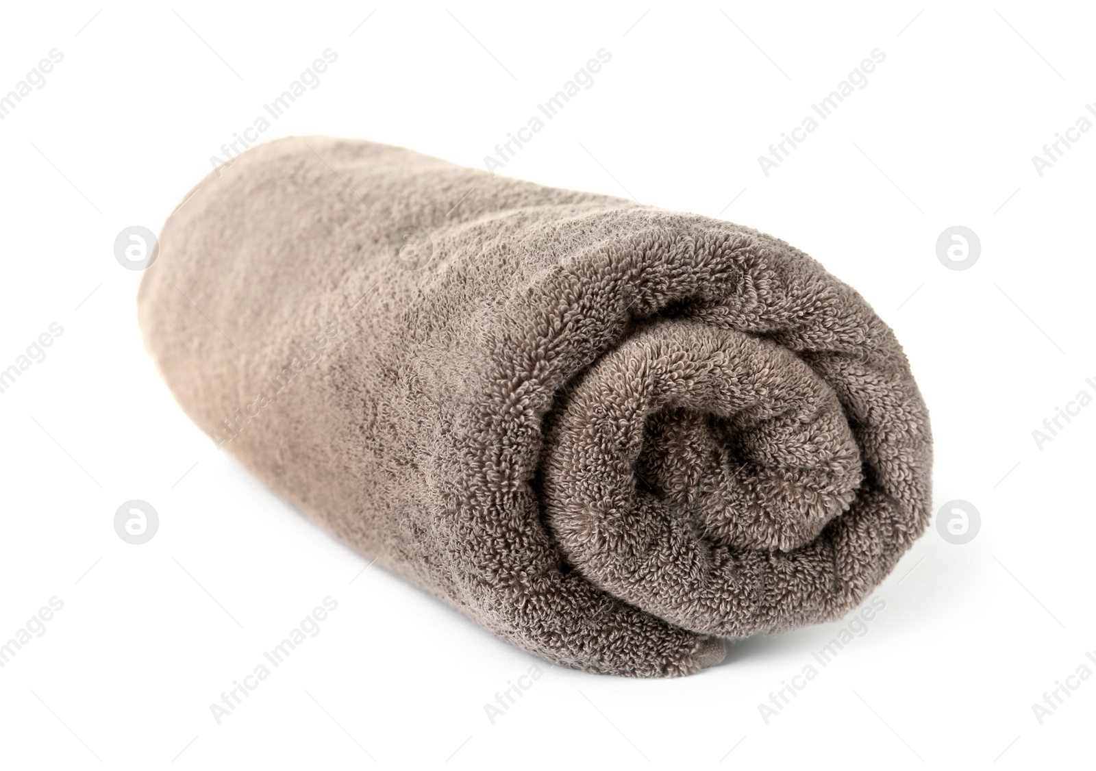 Photo of Rolled clean brown towel on white background