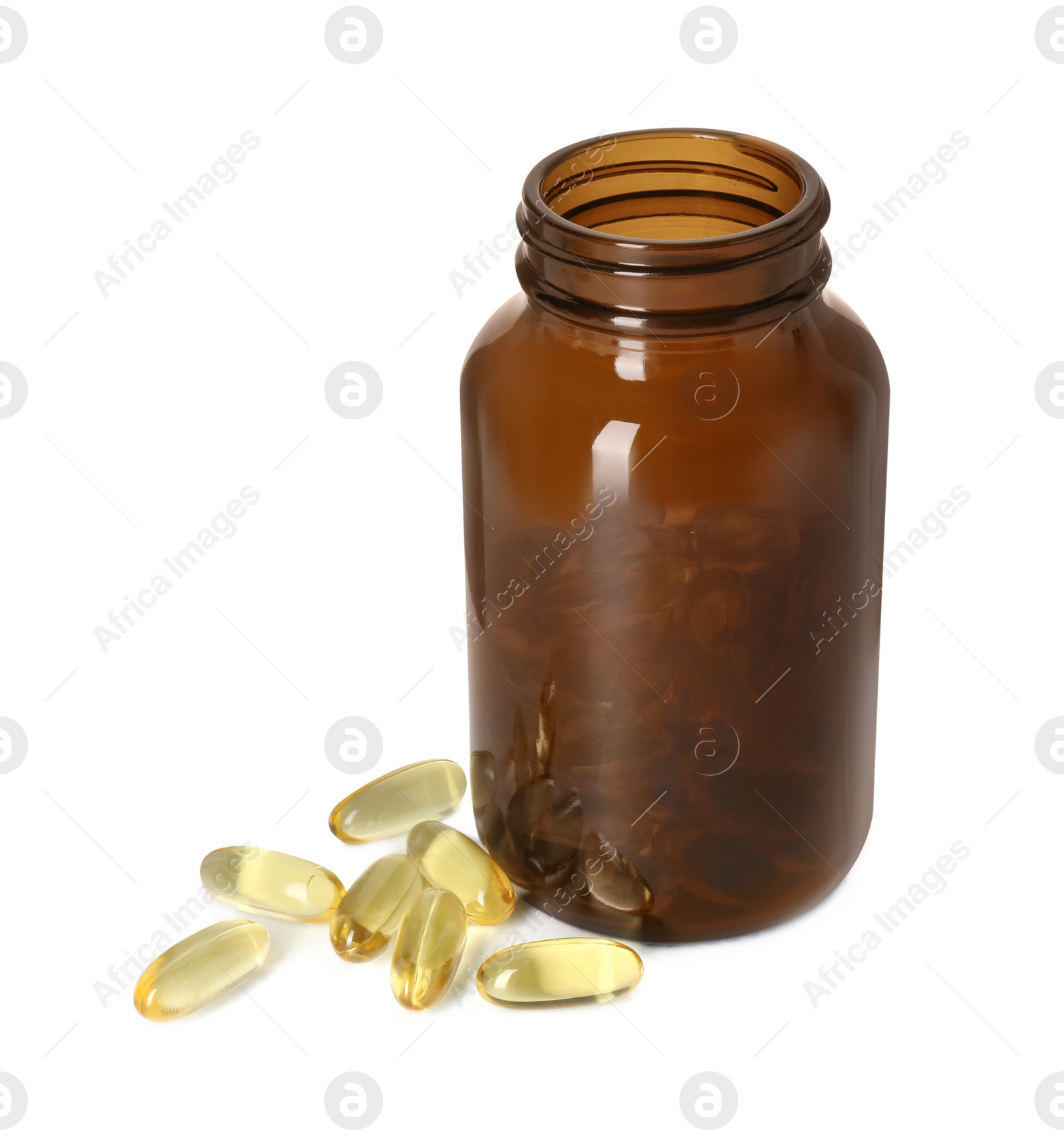 Photo of Bottle and pile of softgel capsules isolated on white