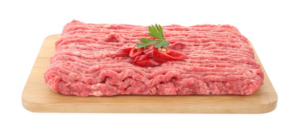 Photo of Board with raw ground meat, chili pepper and parsley isolated on white