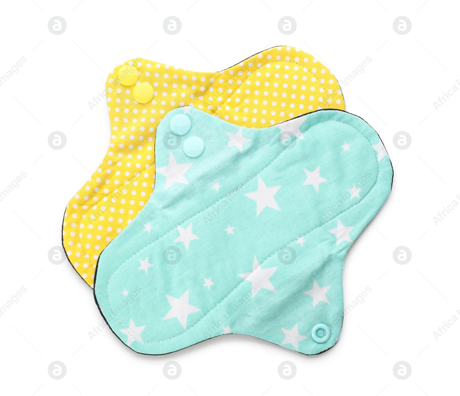 Photo of Cloth menstrual pads on white background, top view. Reusable female hygiene product