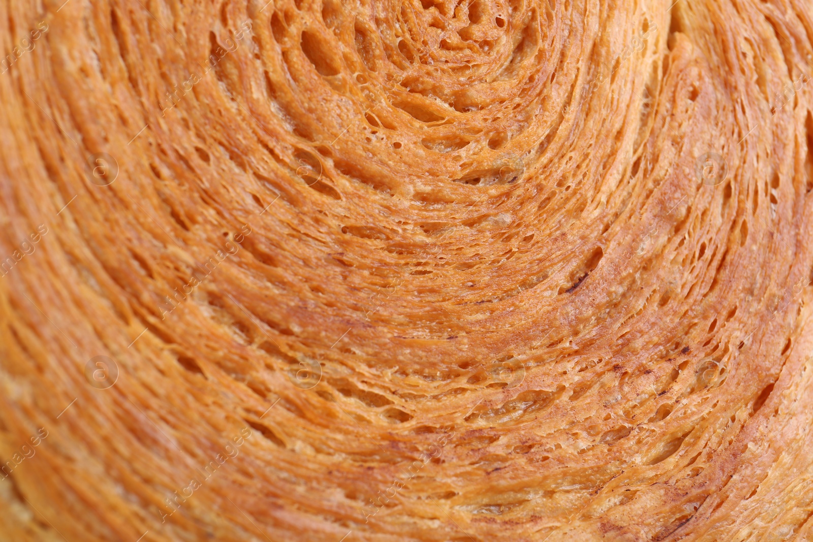 Photo of Tasty puff pastry. Supreme croissant as background, closeup