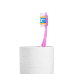 Photo of One plastic toothbrush in holder isolated on white