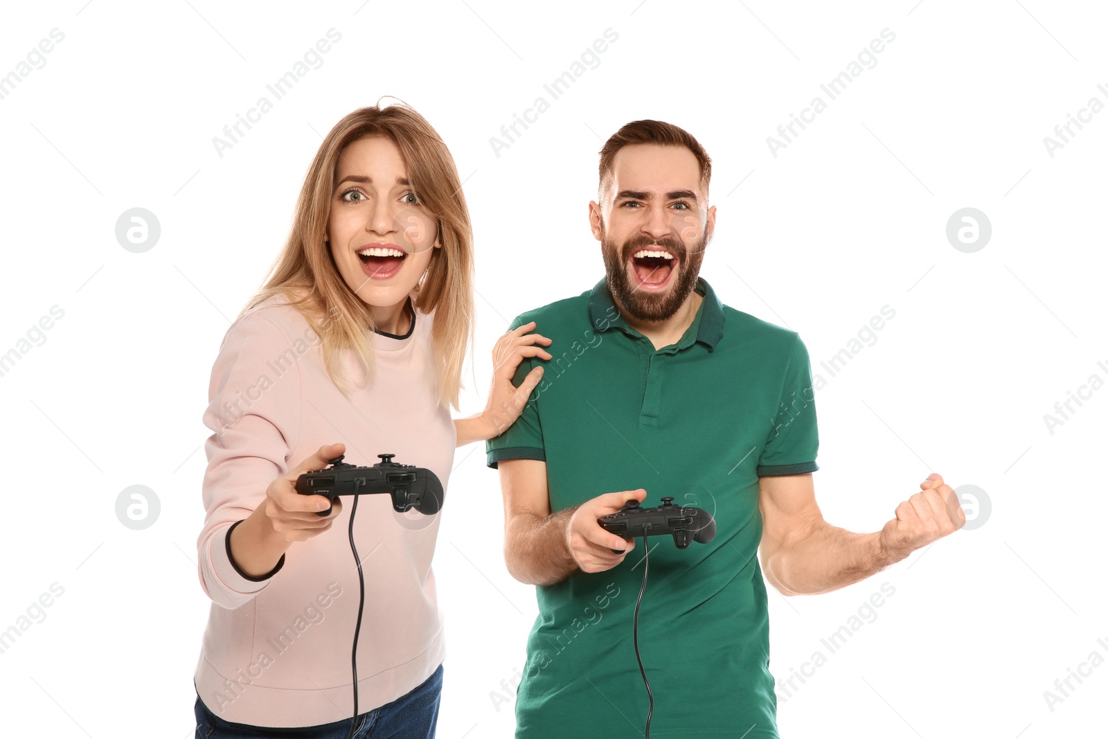 Photo of Emotional couple playing video games with controllers isolated on white