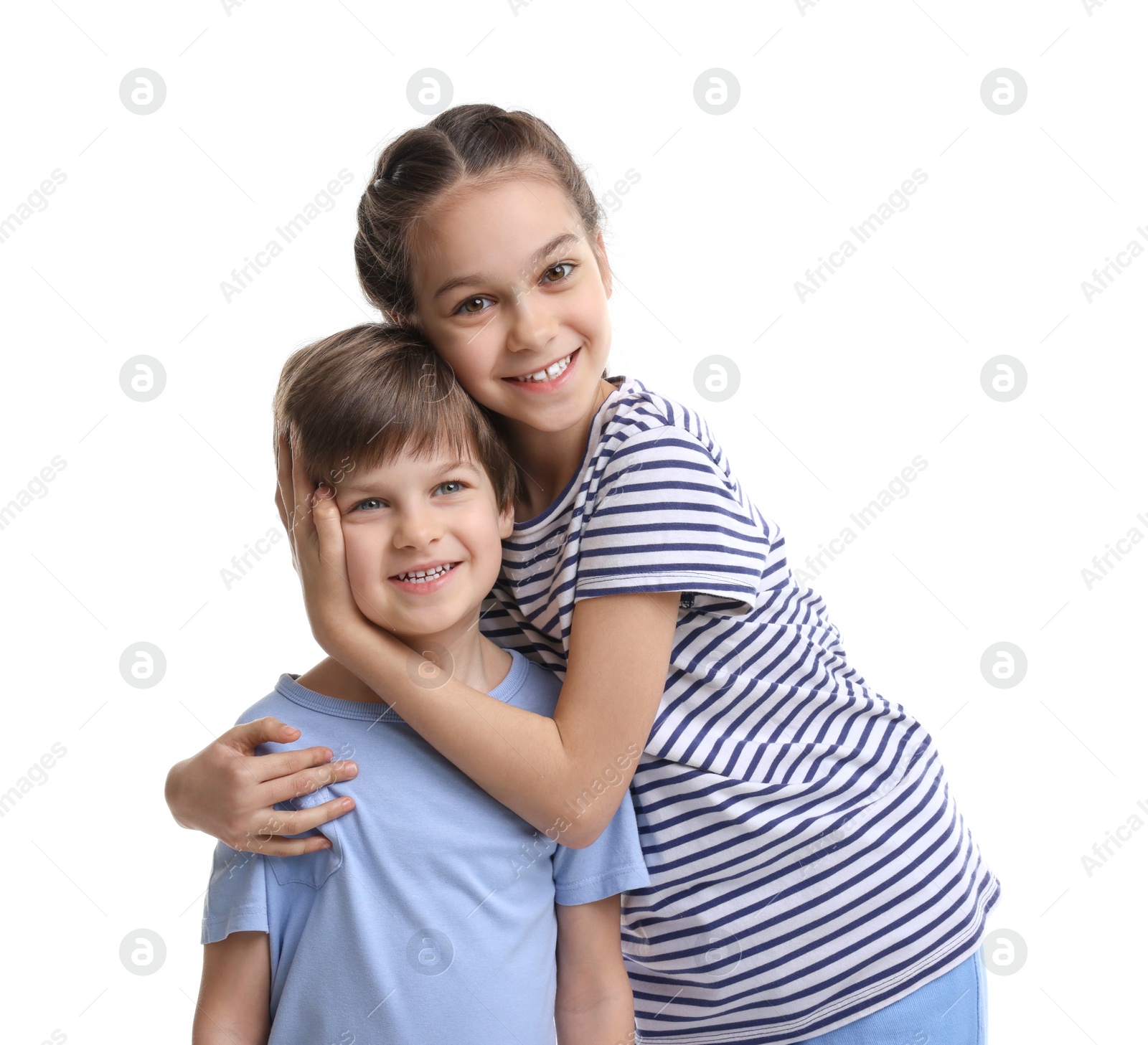 Photo of Happy brother and sister hugging on white background