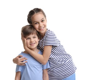 Photo of Happy brother and sister hugging on white background