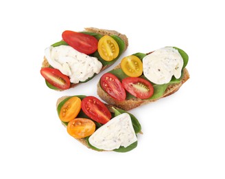 Photo of Delicious sandwiches with burrata cheese and tomatoes isolated on white, top view