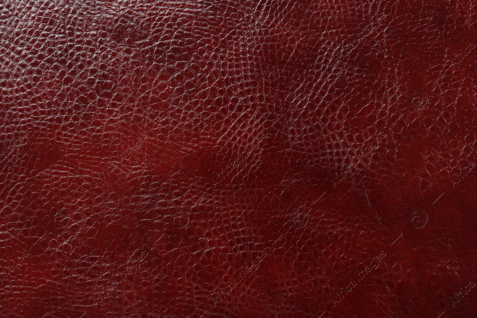 Photo of Beautiful red leather as background, top view