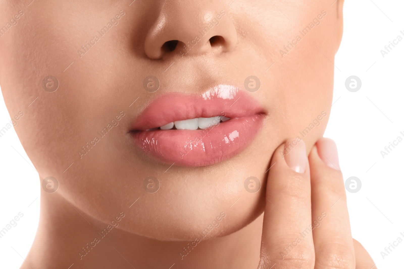 Photo of Young woman with beautiful full lips on white background, closeup