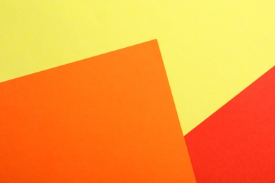 Colorful paper sheets as background, top view