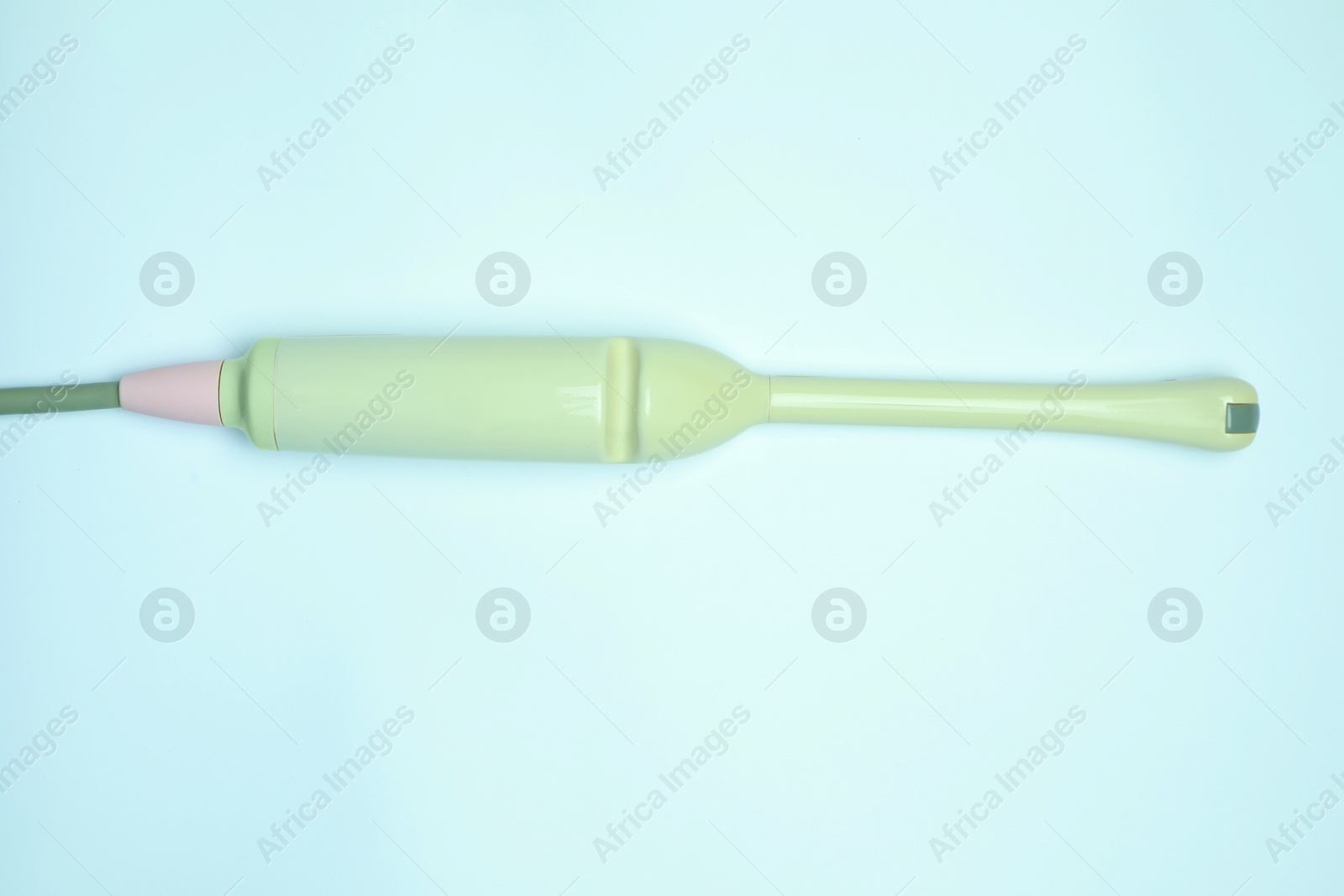 Photo of Ultrasonic transducer on light background, top view