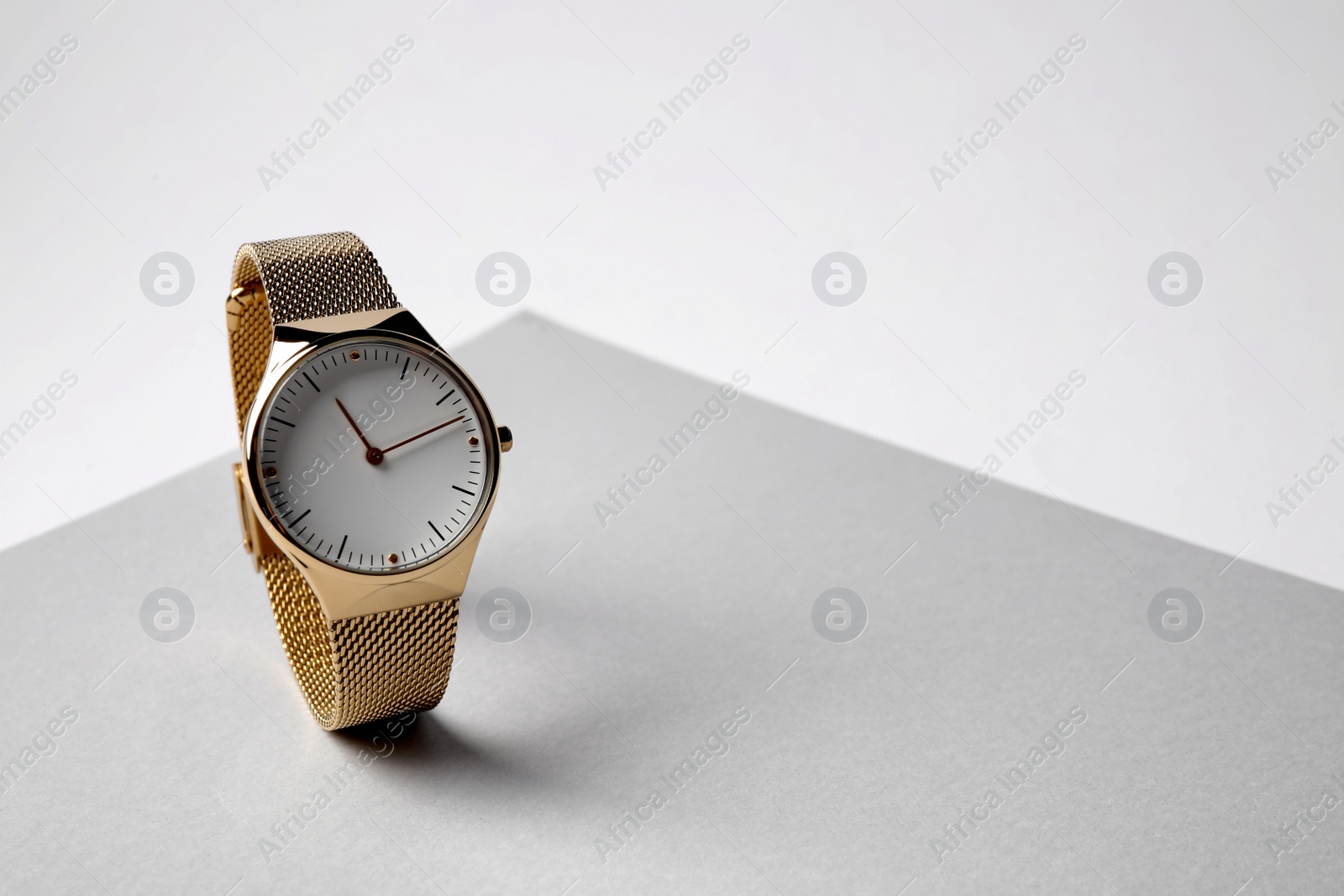 Photo of Luxury wrist watch on white background, space for text