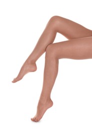 Woman with beautiful long legs wearing tights on white background, closeup